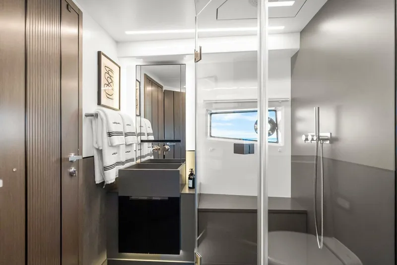  Yacht Photos Pics Modern bathroom interior in 2025 Pearl 63 yacht, featuring sleek design and elegant fixtures.