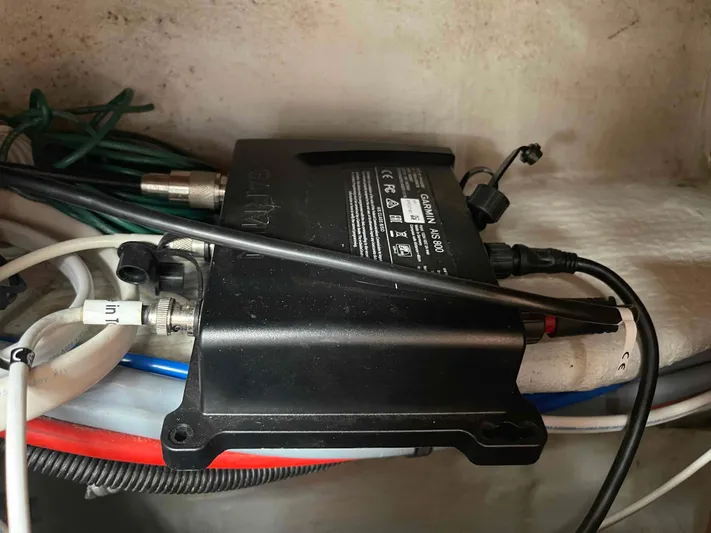 No Agenda Yacht Photos Pics Electrical equipment in a 2003 Jeanneau Deck Salon boat, featuring various connected cables.