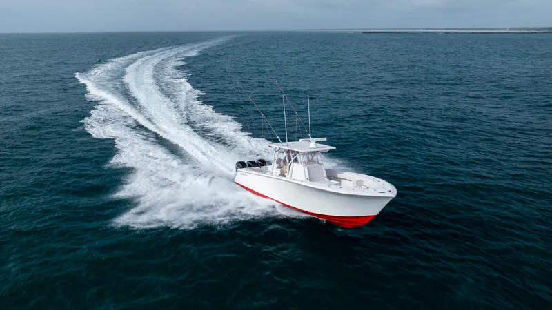  Yacht Photos Pics 2024 SeaHunter 35 Tournament boat cruising on open ocean waters.