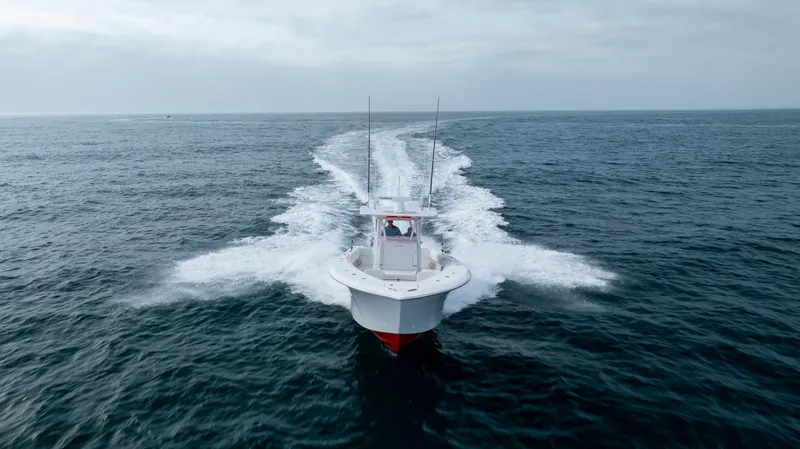  Yacht Photos Pics 2024 SeaHunter 35 Tournament boat cruising on open ocean waters.