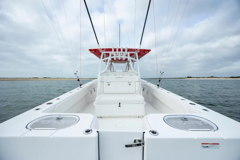  Yacht Photos Pics 2024 SeaHunter 35 Tournament boat on water, showcasing spacious deck and fishing amenities.
