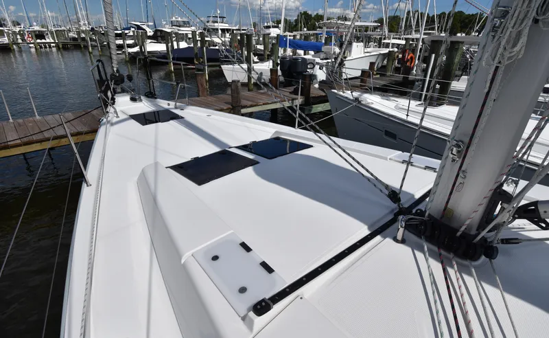 Maelynn Rose Yacht Photos Pics 2019 Hanse 458 yacht docked at marina, showcasing sleek deck design.