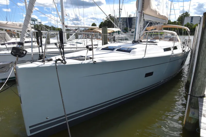 Maelynn Rose Yacht Photos Pics 2019 Hanse 458 yacht docked at marina under blue sky.