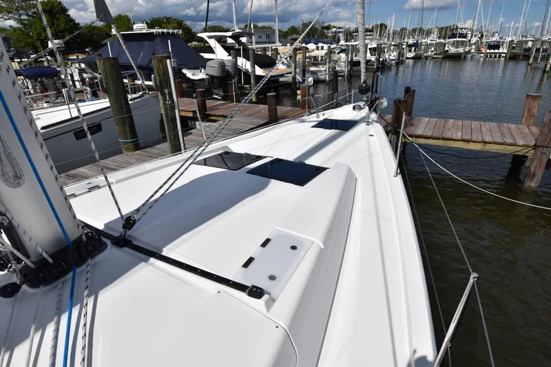 Maelynn Rose Yacht Photos Pics 2019 Hanse 458 yacht docked at marina, showcasing sleek deck design.