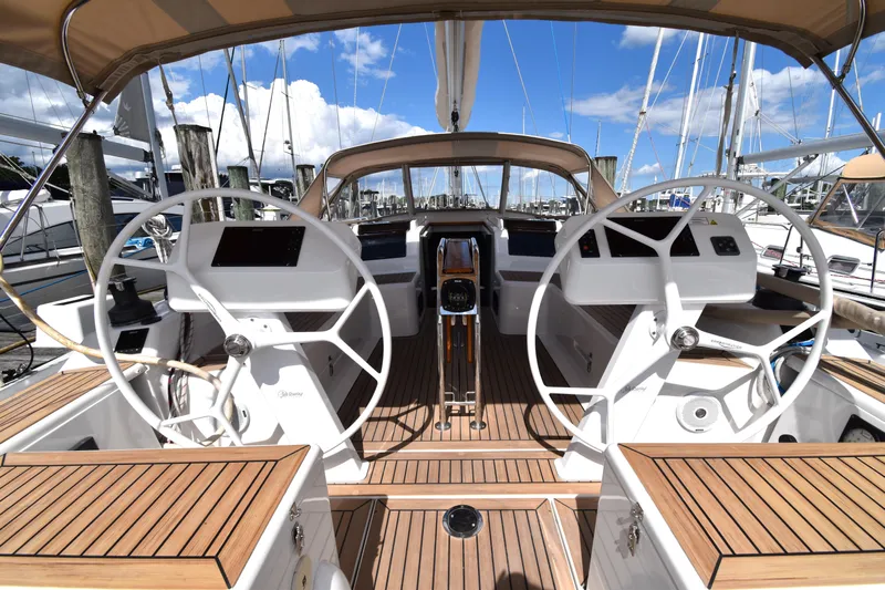 Maelynn Rose Yacht Photos Pics 2019 Hanse 458 yacht cockpit with dual steering wheels and teak decking.
