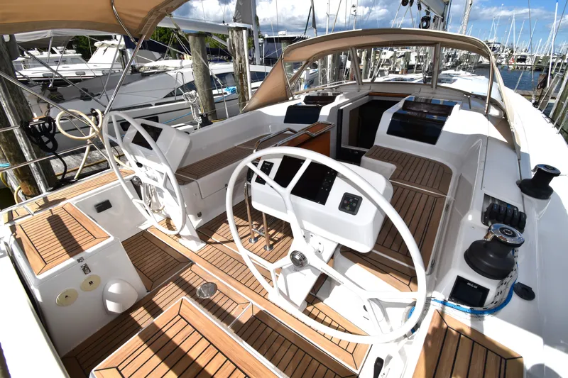 Maelynn Rose Yacht Photos Pics 2019 Hanse 458 yacht cockpit with dual steering wheels and teak decking.