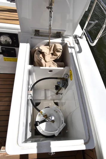 Maelynn Rose Yacht Photos Pics Storage compartment on 2019 Hanse 458 yacht with equipment and accessories.