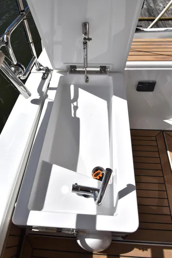 Maelynn Rose Yacht Photos Pics Hanse 458 yacht sink with modern faucet, 2019 model, on teak deck.
