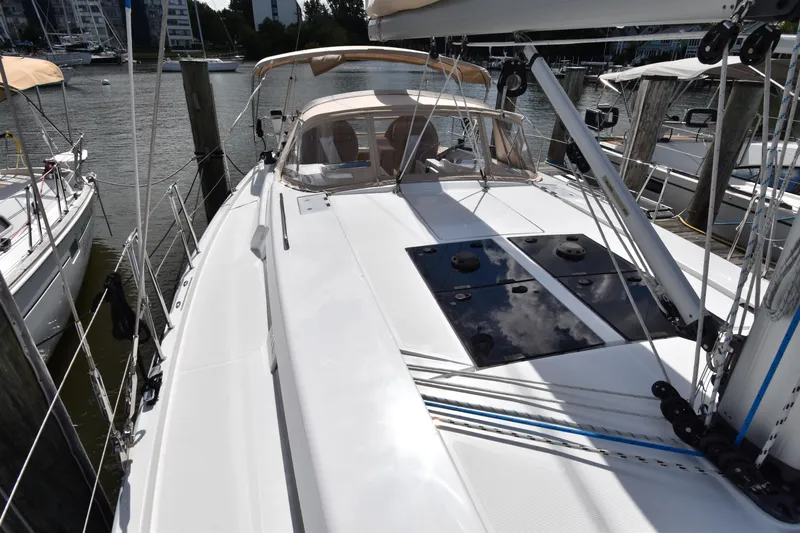Maelynn Rose Yacht Photos Pics 2019 Hanse 458 sailboat docked at marina, showcasing sleek deck design.