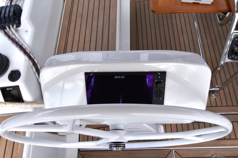 Maelynn Rose Yacht Photos Pics Steering wheel and navigation system on 2019 Hanse 458 yacht.