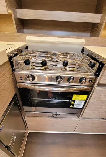 Maelynn Rose Yacht Photos Pics Modern kitchen stove in 2019 Hanse 458 yacht interior.