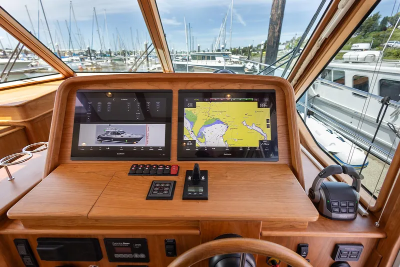 Luca Yacht Photos Pics Helm station of 2023 Sabre 43 Salon Express with dual navigation screens.