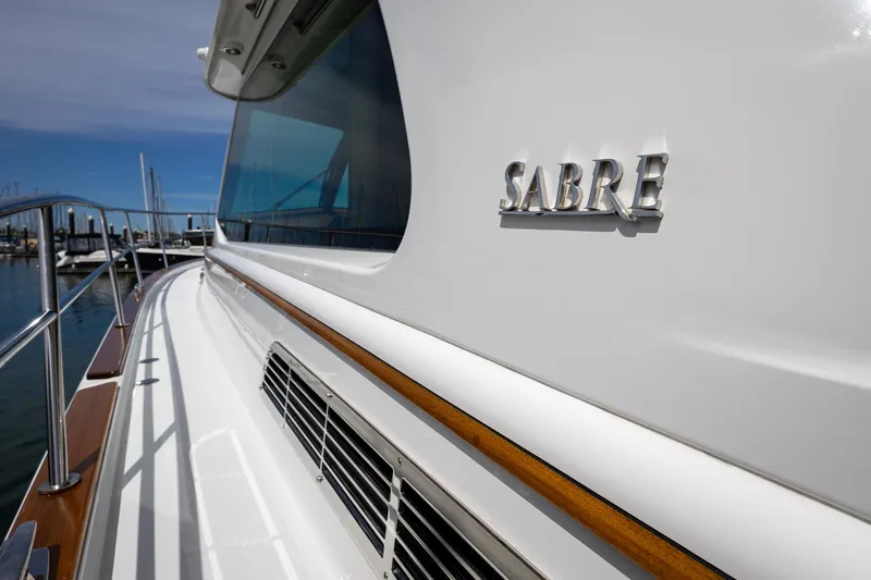 Luca Yacht Photos Pics 2023 Sabre 43 Salon Express yacht side view with logo.