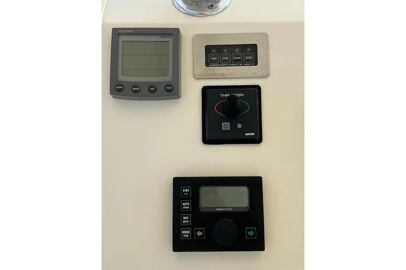 Reel Interest Yacht Photos Pics Control panel of a 2002 Ocean Yachts 56 Super Sport boat.