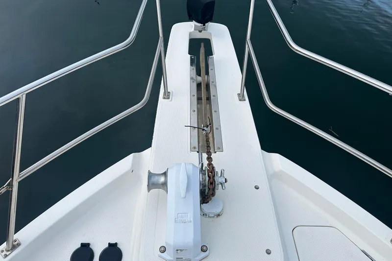 Stacey Lee Yacht Photos Pics 1999 Bayliner 4788 Pilot House Motoryacht bow with anchor and railing.