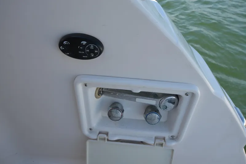  Yacht Photos Pics 2006 Regal Commodore 3560 boat control panel with water in the background.