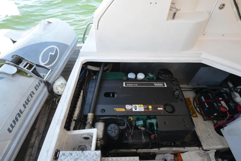  Yacht Photos Pics Engine compartment of 2006 Regal Commodore 3560 with Volvo Penta engine and Walker Bay dinghy.