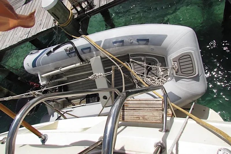  Yacht Photos Pics Overhead view of a 1992 Hatteras 40 Motor Yacht with an inflatable boat docked.