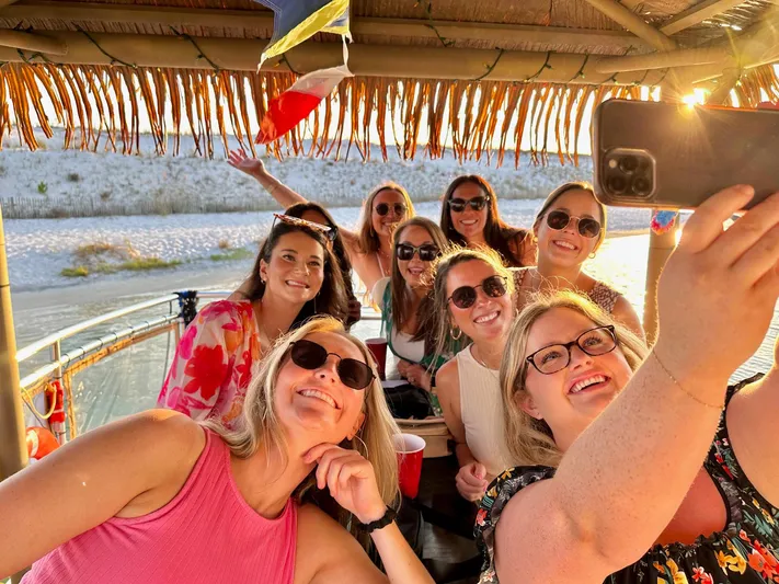Big Kahuna Yacht Photos Pics Group of friends taking a selfie on a 2022 Beachcat COI Tiki Boat.