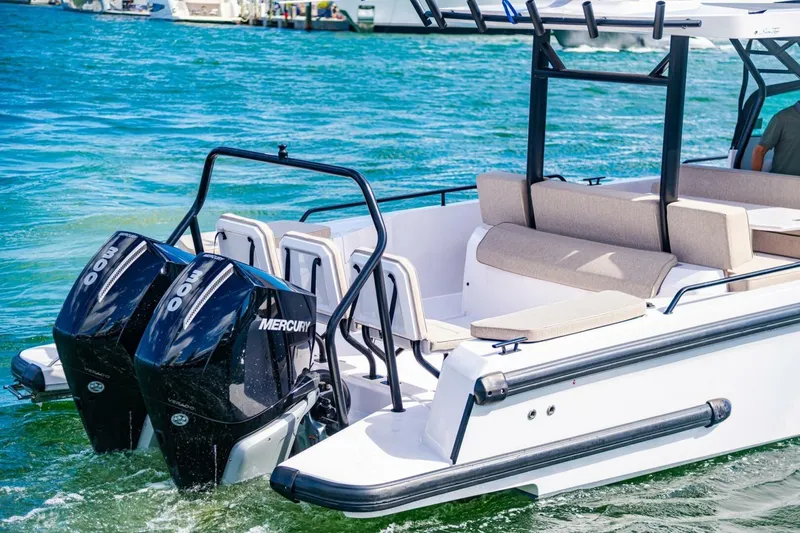 First Byte Yacht Photos Pics 2023 Axopar 37 Sun Top boat with dual Mercury engines on water.