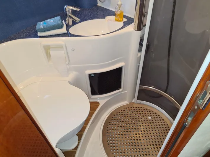 Rmvca Yacht Photos Pics Bathroom interior of 2004 Fairline Targa 43 yacht with sink, toilet, and shower.
