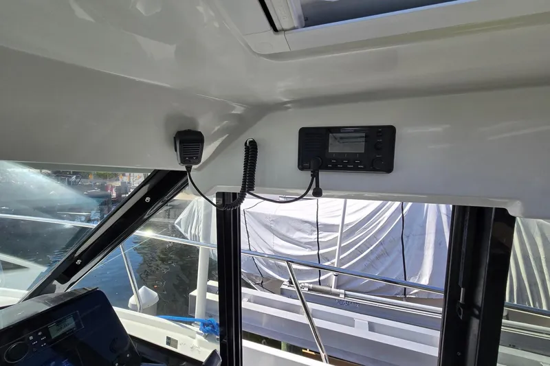  Yacht Photos Pics Interior view of 2020 Jeanneau NC 1095 boat with communication equipment.