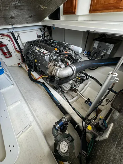 "flying Low" Yacht Photos Pics Engine compartment of a 2008 Back Cove 33 boat, showcasing detailed mechanical components.