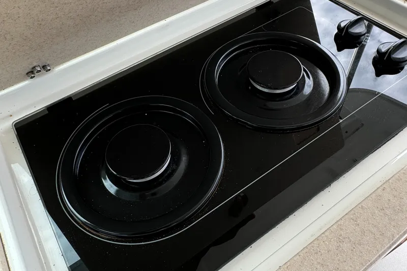 "flying Low" Yacht Photos Pics Stovetop on 2008 Back Cove 33 boat, featuring two burners and control knobs.