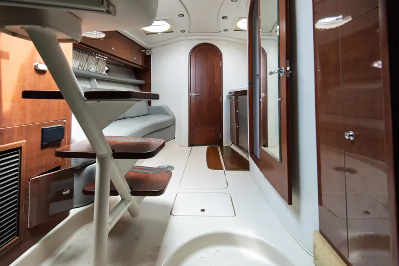  Yacht Photos Pics 2014 Four Winns V375 yacht interior with wooden finishes and modern design.