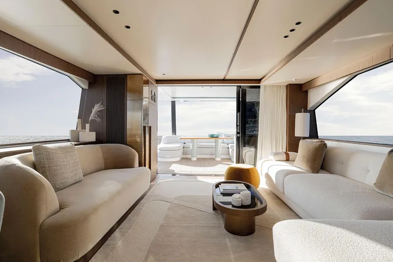  Yacht Photos Pics Luxurious interior of 2025 Azimut Fly 72 yacht with elegant seating and ocean view.
