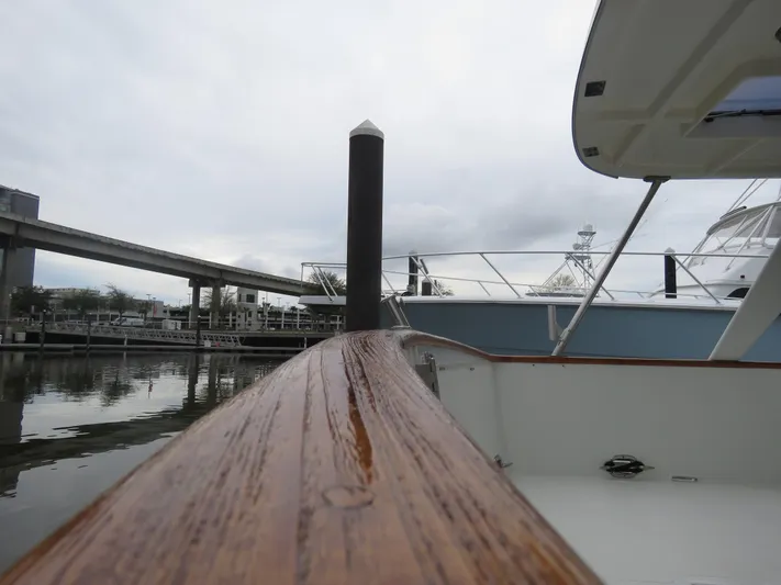 Patient Lady Yacht Photos Pics DeFever 49 Pilothouse 1987 at dock, close-up view.