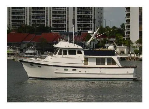Patient Lady Yacht Photos Pics 1987 DeFever 49 Pilothouse yacht docked in harbor.