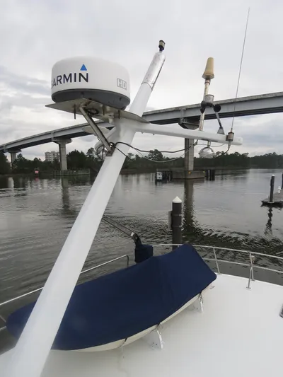 Patient Lady Yacht Photos Pics DeFever 49 Pilothouse 1987 with Garmin equipment on calm waters.