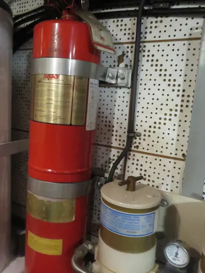 Patient Lady Yacht Photos Pics Fire extinguisher and equipment in DeFever 49 Pilothouse, 1987 model.