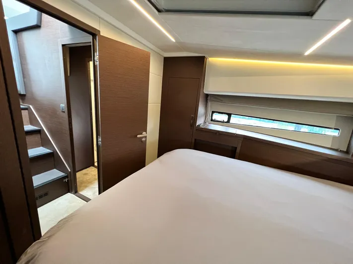  Yacht Photos Pics Luxurious interior of 2023 Prestige 460 Flybridge yacht bedroom with modern design.