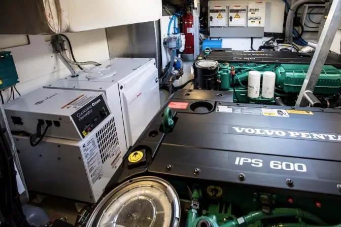  Yacht Photos Pics Engine room of 2023 Prestige 460 Flybridge with Volvo Penta IPS 600 engines and Cummins Onan generator.
