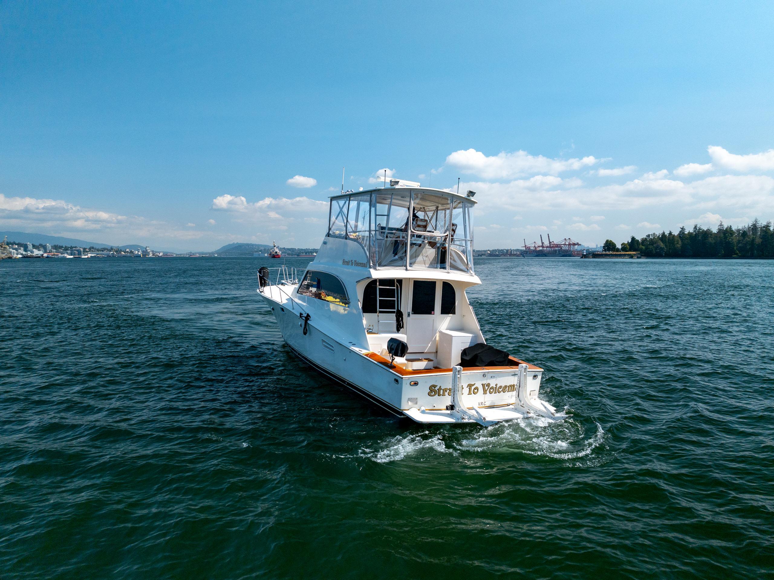 1985 Post 46 Convertible Yacht on open water.