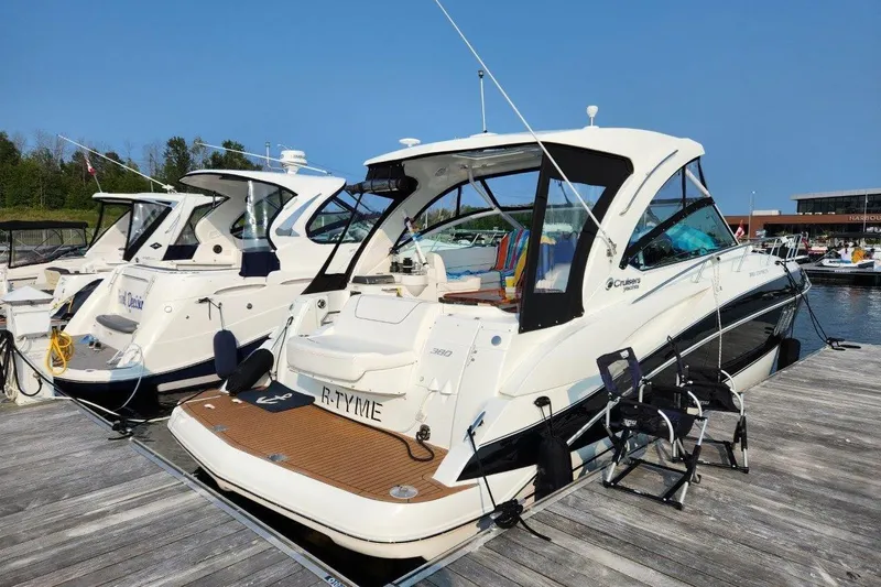  Yacht Photos Pics 2012 Cruisers Yachts 380 Express docked at marina, sunny day, clear blue sky.