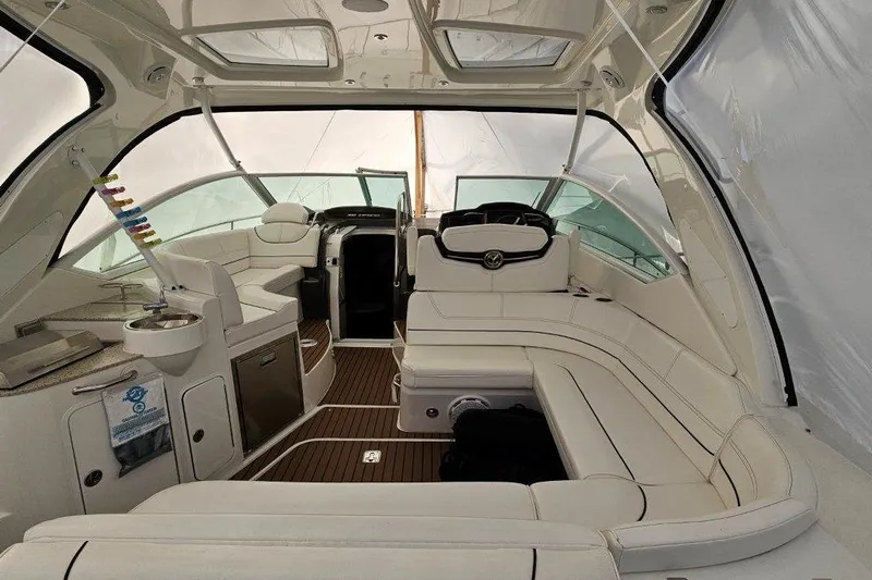  Yacht Photos Pics 2012 Cruisers Yachts 380 Express interior with luxurious seating and modern amenities.