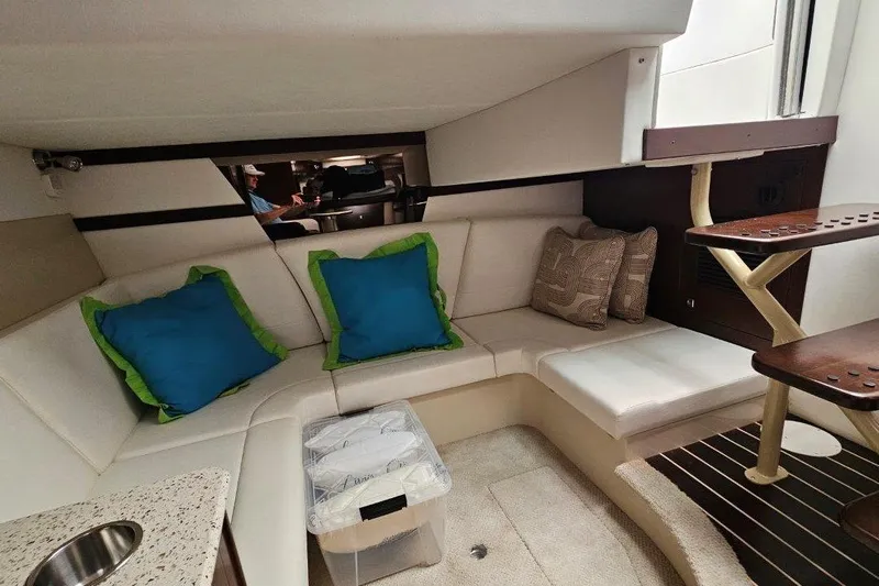  Yacht Photos Pics Interior of 2012 Cruisers Yachts 380 Express with cozy seating and vibrant cushions.