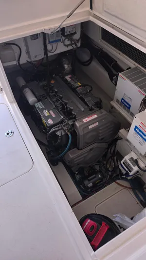 Rack Em Up Yacht Photos Pics Engine compartment of 2008 Ocean Yachts 37 Billfish, showcasing mechanical components and wiring.