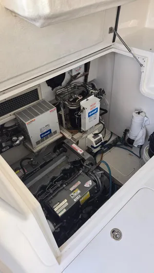 Rack Em Up Yacht Photos Pics Engine compartment of 2008 Ocean Yachts 37 Billfish, showcasing mechanical components.