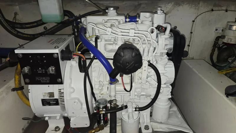 Rack Em Up Yacht Photos Pics Engine compartment of 2008 Ocean Yachts 37 Billfish, showcasing detailed mechanical components.