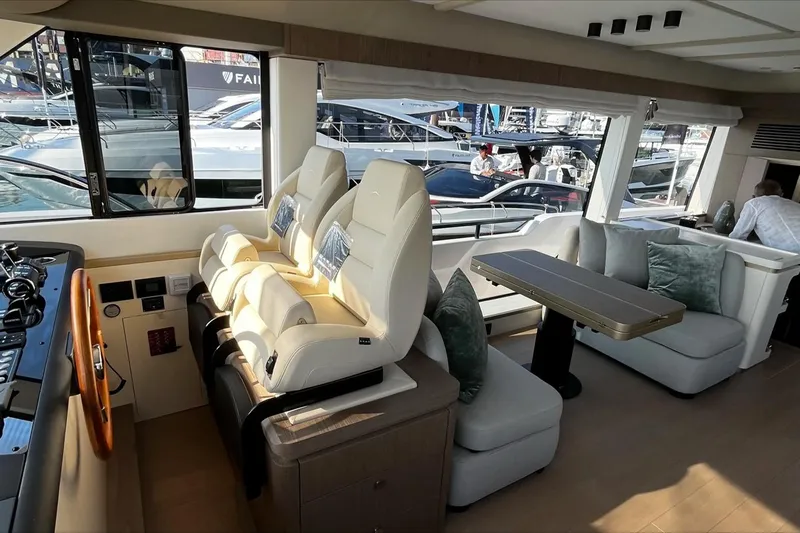  Yacht Photos Pics Luxurious interior of 2024 Azimut Magellano 60 yacht with plush seating and modern design.