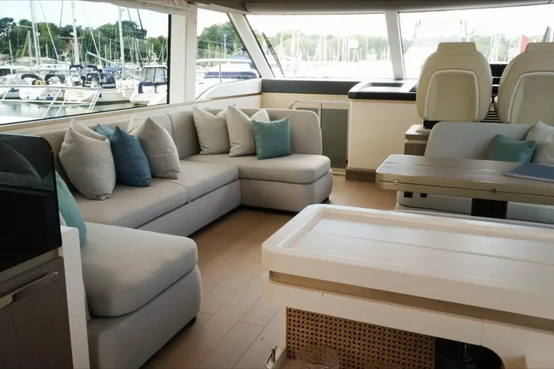  Yacht Photos Pics Luxurious interior of 2024 Azimut Magellano 60 yacht with plush seating and elegant design.