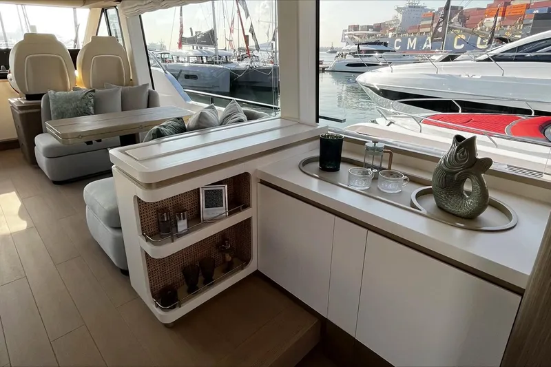  Yacht Photos Pics Luxurious interior of 2024 Azimut Magellano 60 yacht with elegant seating and decor.