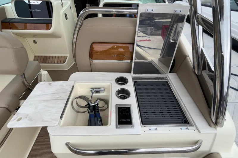  Yacht Photos Pics Luxurious 2026 Chris-Craft Calypso 28 boat interior with modern amenities and sleek design.
