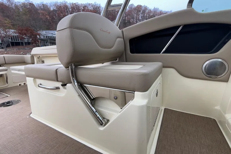  Yacht Photos Pics 2026 Chris-Craft Calypso 28 boat interior with beige seating and modern design.