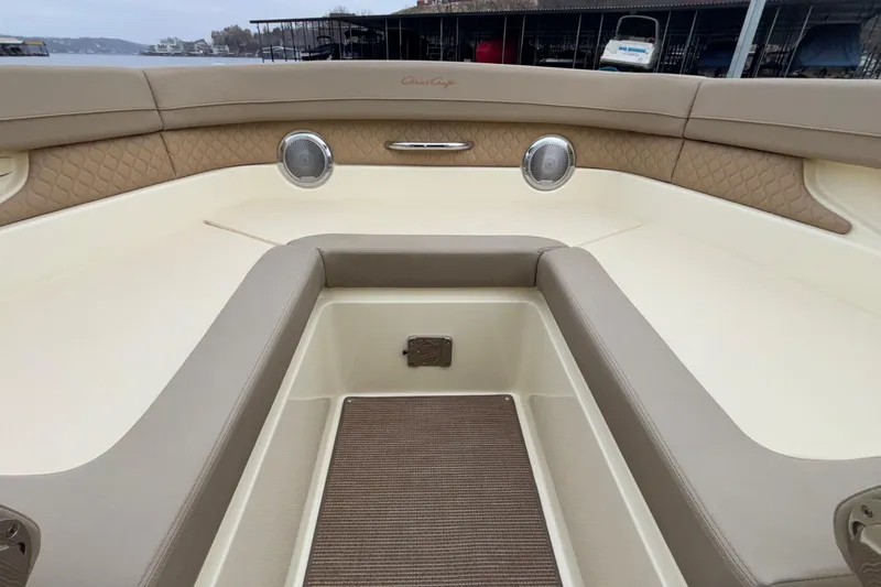  Yacht Photos Pics 2026 Chris-Craft Calypso 28 boat interior with beige seating and elegant design.
