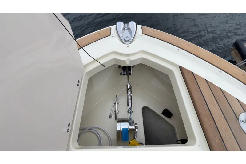  Yacht Photos Pics 2026 Chris-Craft Calypso 28 anchor compartment with teak decking and stainless steel fittings.